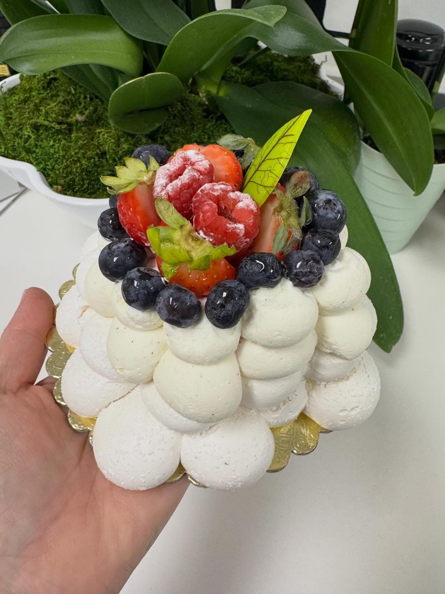 Mixed berry mousse cake with a meringue base